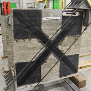 Masonry panel reinforced with FRP